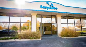 The welcoming front door of Easy Auto Cleveland in Tennessee in the late afternoon sun.